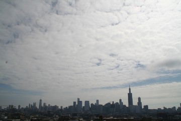 Fototapeta na wymiar Panorama of City and Clouds