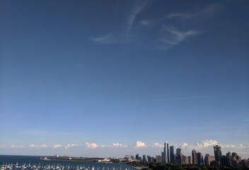 Fototapeta premium Panorama of City with Blue Sky and Clouds