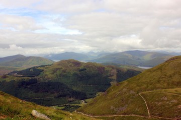 Fototapeta na wymiar landscape with mountains and blue sky. Scotland highlands 