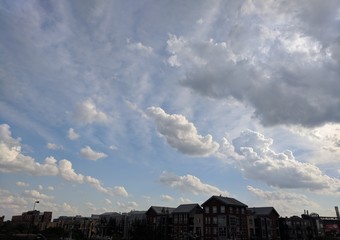 Fototapeta na wymiar Beautiful Clouds Over Buildings