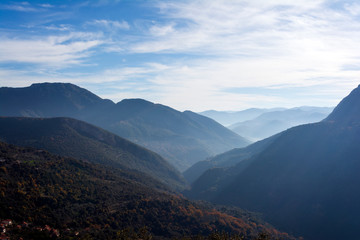 Fototapeta premium View of misty fog mountains in Arcadia, Greece
