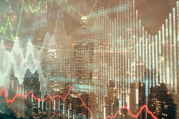 Double exposure of forex chart drawings over cityscape background. Concept of success.
