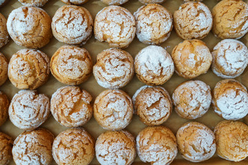 Sweet desserts cake and pastries on the table during the event. Catering servicing of guests and participants during mass events. Large number of sweet and cupcakes. Soft focus, bokeh, abstract.