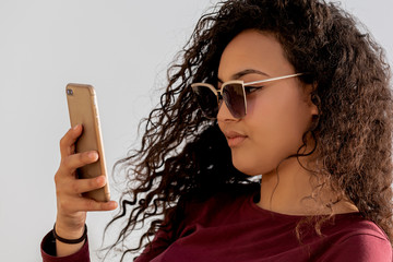 Young And Fashionable Girl Using Smartphone
