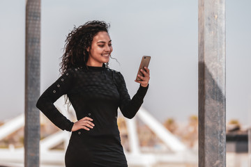 Young And Fashionable Girl Using Smartphone
