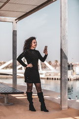 Young And Fashionable Girl Using Smartphone