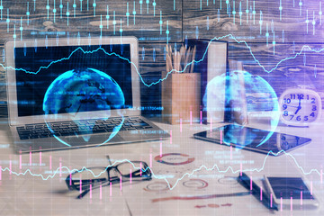 Multi exposure of chart and financial info and work space with computer background. Concept of international online trading.