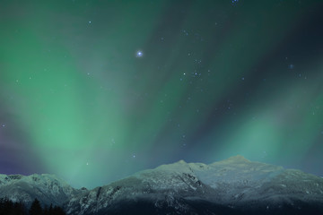 Fototapeta na wymiar Aurora Borealis with mountains