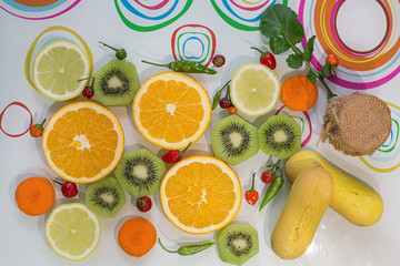lemon kiwi and cookies on table