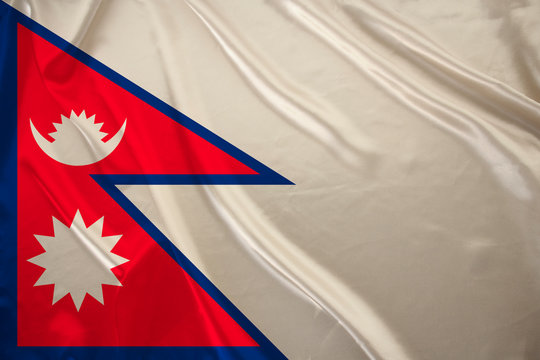 Nepal silk national flag of the modern state with beautiful folds, concept of tourism, travel, emigration, global business