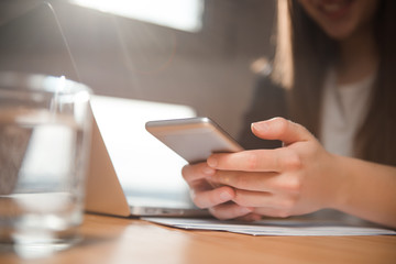 Woman using her smart phone