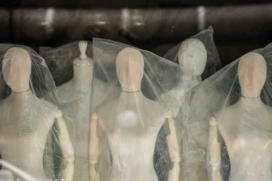 Boutique display window with mannequins - Powered by Adobe