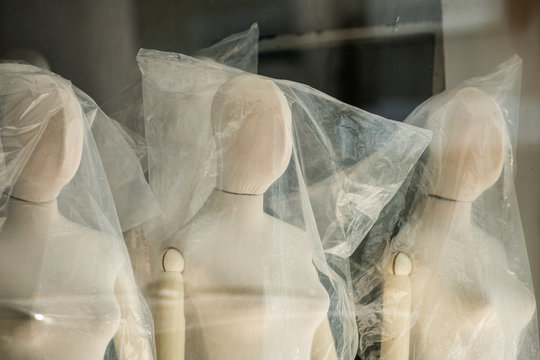 Boutique display window with mannequins