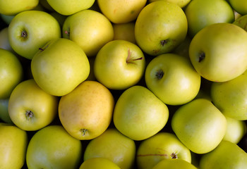 Fresh healthy bio green apples in Monaco supermarket. Background.