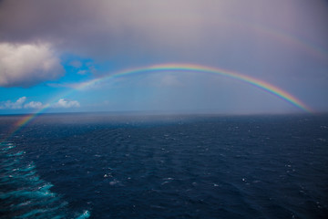 Double rainbow on the sea.