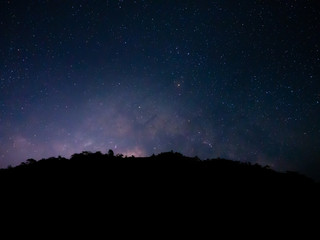 Fototapeta na wymiar beautiful night sky from milky way galaxy with stars and meteor over mountain at national park, Thailand on February 2020