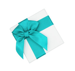 Closeup white gift box with blue pastel ribbon isolated on white background with clipping path, Christmas and new year's day concept