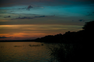 Fototapeta na wymiar After sunset and approaching blue hour in Lake Monroe, FL.