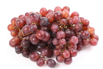 Red grape with water drops, closeup, isolated on white background