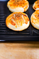 The toasted steamed bread on the plate