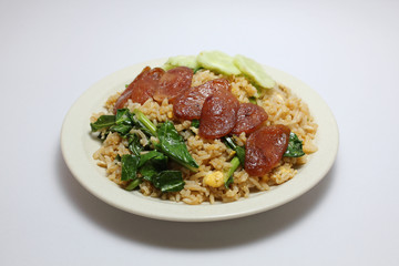 Fried rice with Chinese sausage and egg isolated on white background, top view