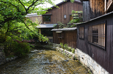 Japanese Old Wooden Houses were Built Side of the River. Traditional Japan Concept, Historical Buildings in Garden.
