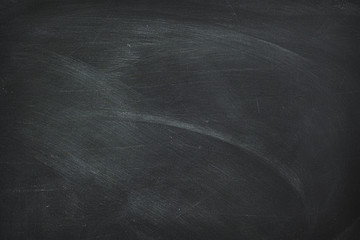 Abstract texture of chalk rubbed out on blackboard or chalkboard , concept for education, banner, startup, teaching , etc.