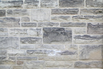 Gray stone wall closeup background photo texture