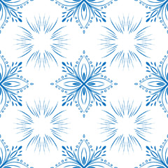 Blue tile seamless pattern design. Doodle snow or mandala illustration.
