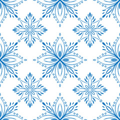 Blue tile seamless pattern design. Doodle snow or mandala illustration.