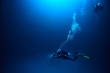 Obraz na płótnie Canvas cenote angelita, mexico, cave diving, extreme adventure underwater, landscape under water fog