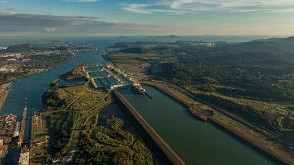 Beautiful aerial view of the Beautiful aerial view of the Panama Channel on the Sunset - obrazy, fototapety, plakaty