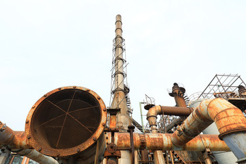 Unused and abandoned metal pipes in factories