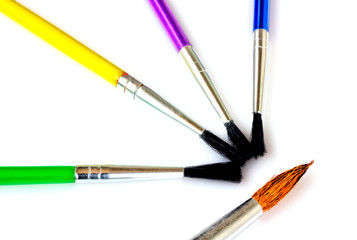 Paint brushes isolated on white background close up view