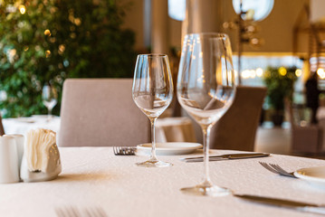  Served dinner table in a restaurant. Restaurant interior