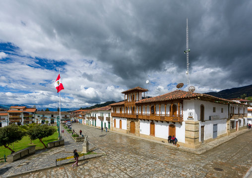 Panoramic view of the City Hall&acute;s building of Chacas town at the main square with cloudscape in the background in Ancash Region, Peru