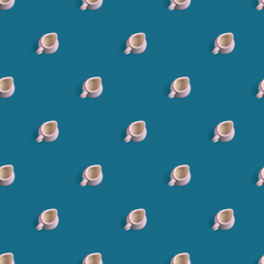 seamless pattern of white milk jug on a blue background