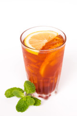 Ice black tea with lemon slice isolated on white background