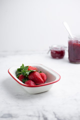 Summer healthy fruit composition with red strawberries