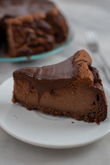 home made chocolate cheesecake on a wooden table