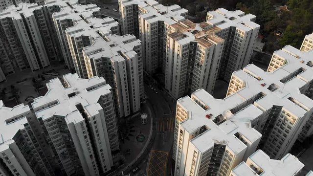 4K UHD aerial drone shot slow reveal of city scape