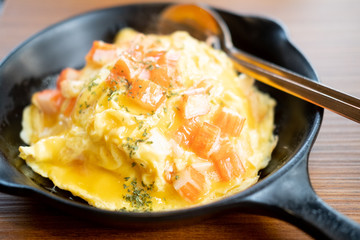 Creamy omelet with crab stick cover rice © Dontree