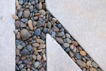 Abstract background with decorative floor pattern of gravel stones