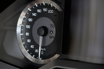 Motorcycle handlebar controls including speedometer