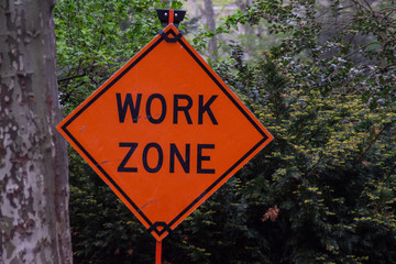 Orange work zone sign