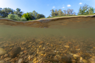 Underwater view of the gravel riverbed on the Drava River in Croatia