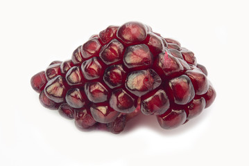Ripe fresh juicy tropical POMEGRANATE fruit isolated on white background. Full dept of field. 