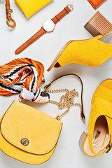 Flat lay with woman fashion accessories in yellow colors. Fashion, online beauty blog, summer...