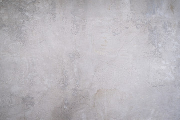 Fototapeta na wymiar Texture of gray concrete wall surface. Some crack and scratch, suitable for use as a pattern or background image.