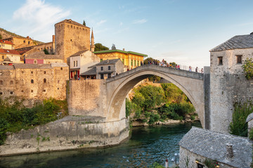 Fototapeta na wymiar Stari Most bridge at sunset in old town of Mostar, BIH